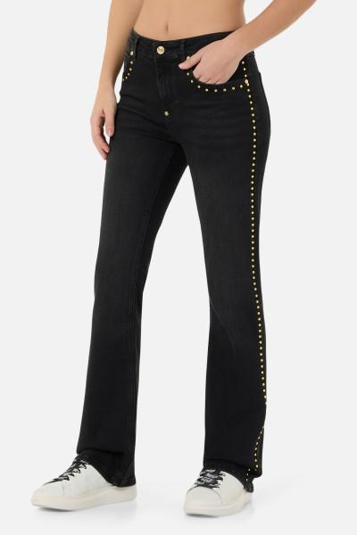 Jeans Neri A Zampa Con Borchie